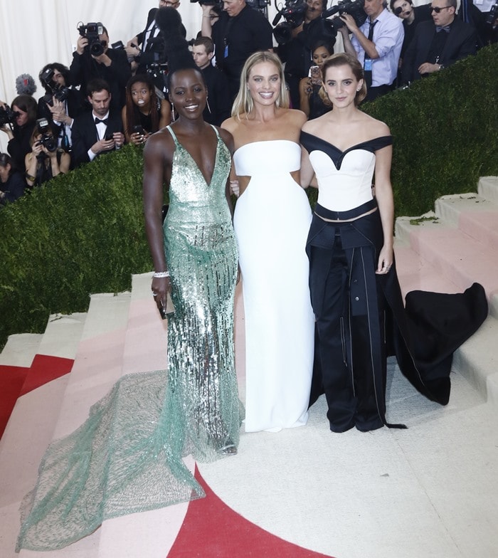Lupita Nyong'o, Margot Robbie and Emma Watson pose for photos on the steps of the Met Gala