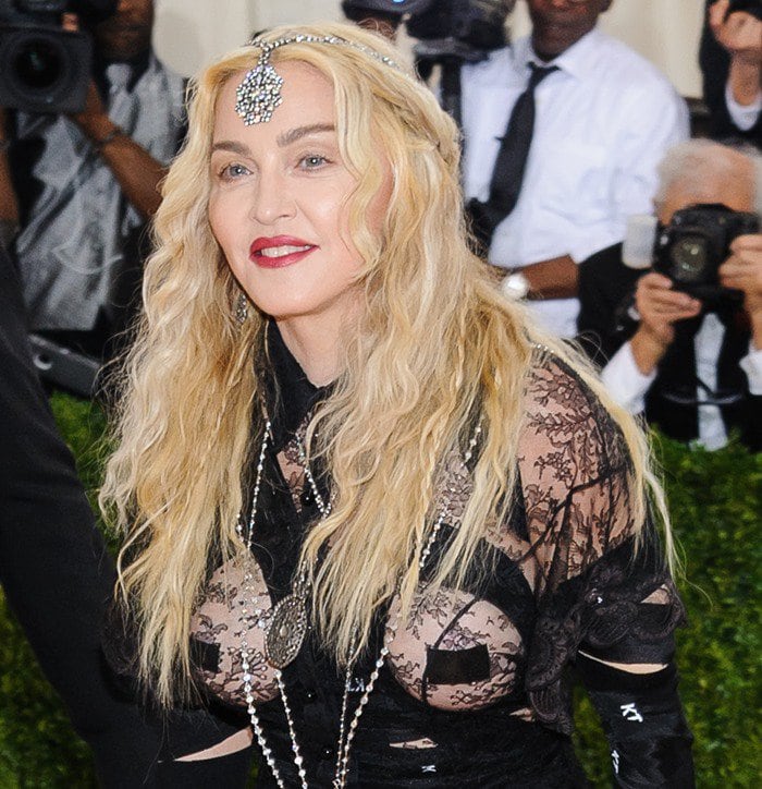 Madonna tops her blonde hair with a headpiece at the "Manus x Machina: Fashion In An Age Of Technology" Costume Institute Gala