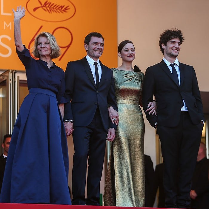 Marion Cotillard poses with "From the Land of the Moon" director Nicole Garcia and co-stars Louis Garrel and Alex Brendemuhl at the Cannes Film Festival