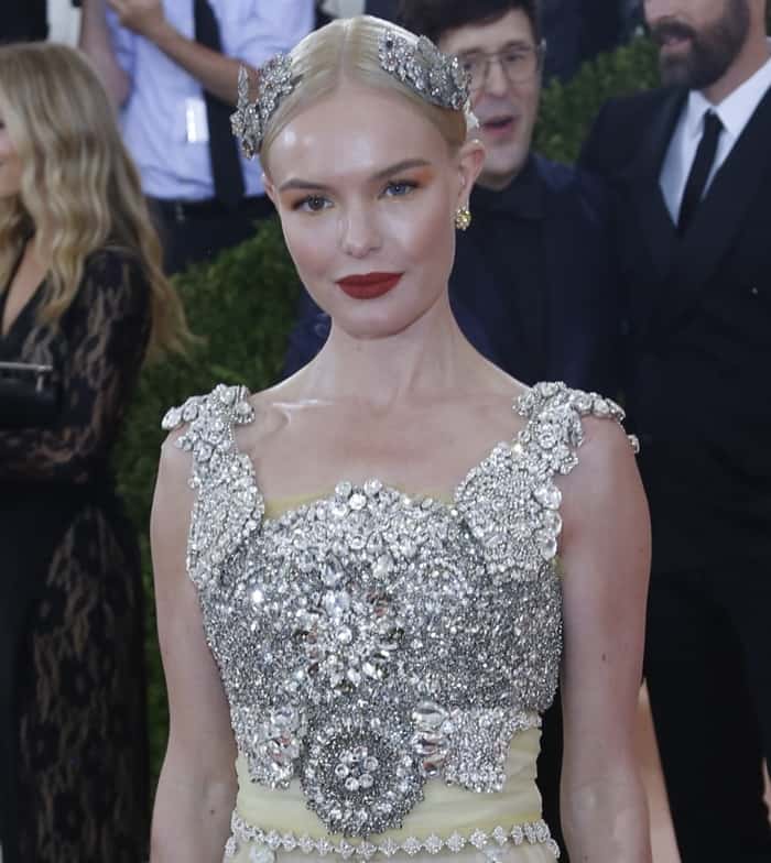 Kate Bosworth wearing a Dolce & Gabbana Alta Moda gown in tulle with crystal embellishment, silk ribbon, and glass pearls