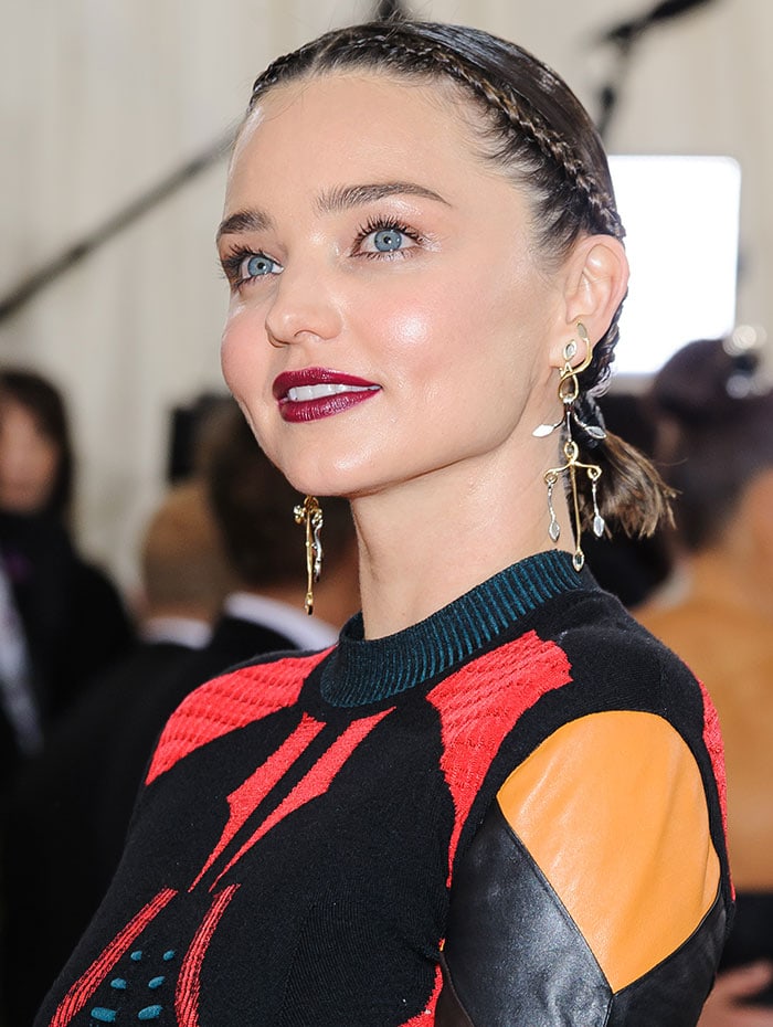 Miranda Kerr sports tiny braids in her hair at the 2016 Met Gala themed "Manus x Machina: Fashion in an Age of Technology"