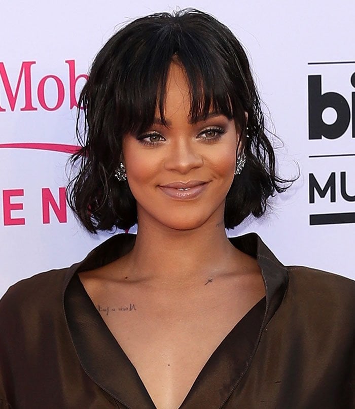 Rihanna tousles her dark hair for the 2016 Billboard Music Awards