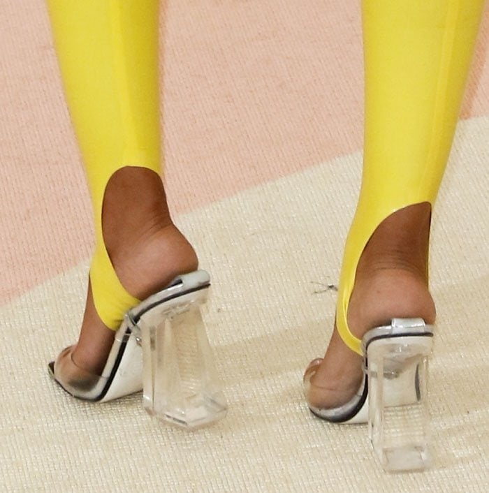 Solange Knowles completes her bold look with Loewe Spring 2016 sandals featuring transparent PVC straps and sculptural clear lucite heels