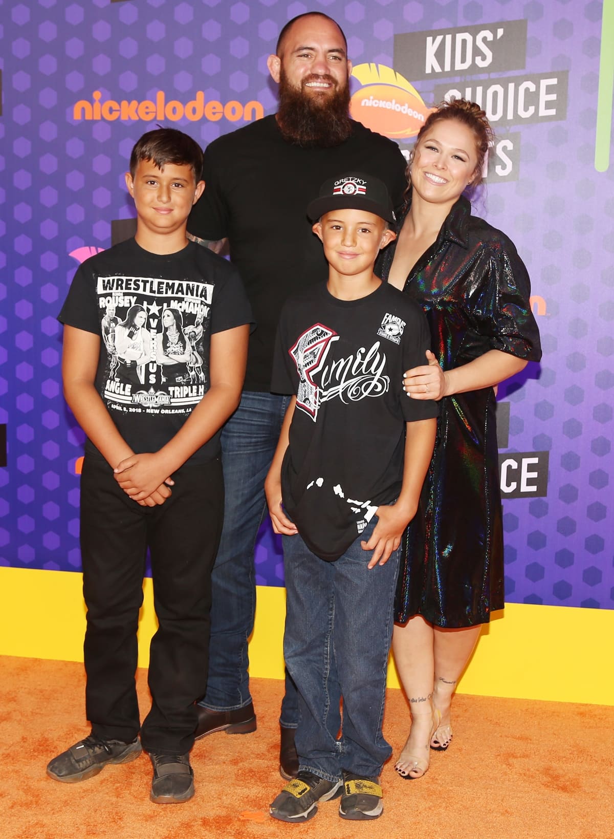 WWE wrestler Ronda Rousey and mixed martial artist Travis Browne with his sons Keawe and Kaleo