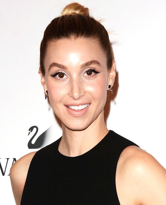 Whitney Port wears her hair in a top knot at the Swarovski Be Brilliant event