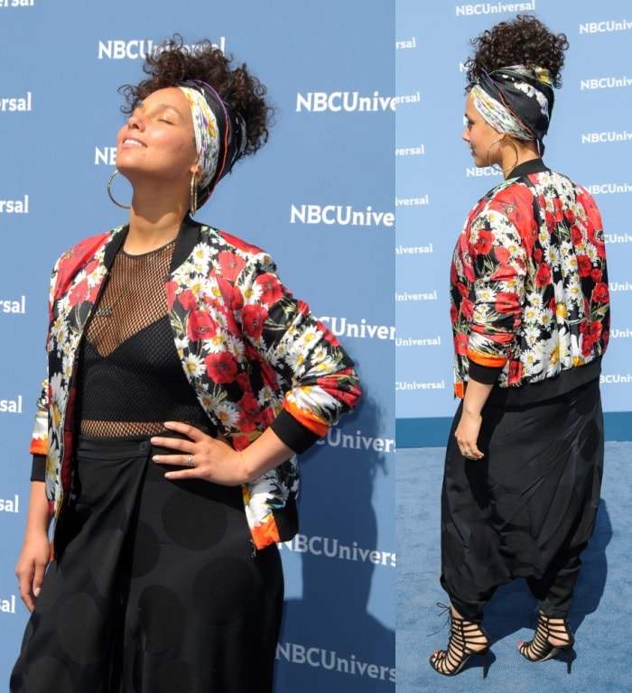 Alicia Keys poses for photos at the NBCUniversal Upfront presentation in a wildly colorful and baggy ensemble