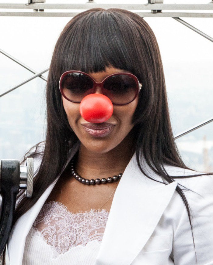 Naomi Campbell wears her hair down as she arrives at the Red Nose Day celebration