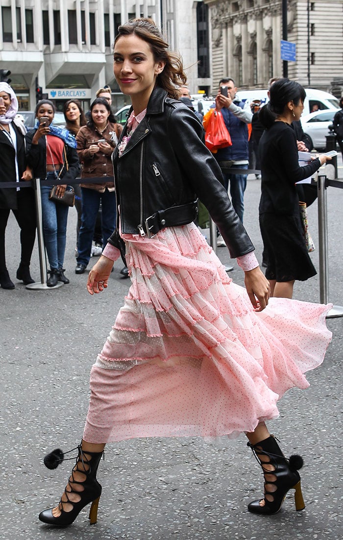 Alexa Chung mixes tough and girly in a Gucci dress leather and biker jacket