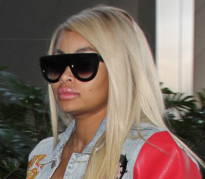 Blac Chyna shows off her bleached hair as she arrives at the Los Angeles International Airport