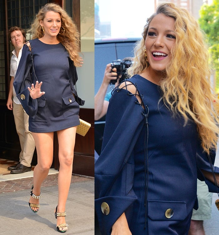 Blake Lively shows off her growing baby bump in a navy blue Monse dress
