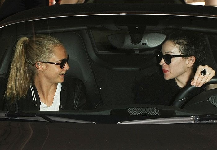 Cara Delevingne and rumored fiancée St. Vincent reunite in a vehicle outside LAX