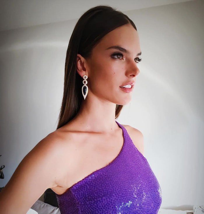 Alessandra Ambrosio wears a purple Michael Kors dress