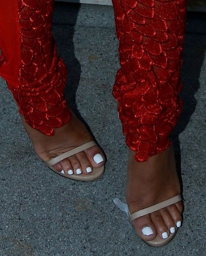 Christina Milian's feet in nude leather Stuart Weitzman sandals