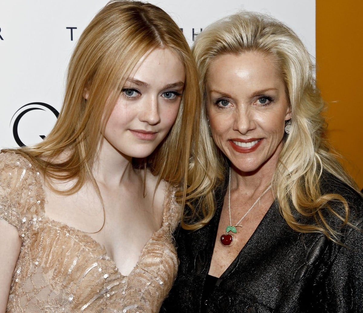 Dakota Fanning and musician Cherie Currie attend "The Runaways" New York premiere