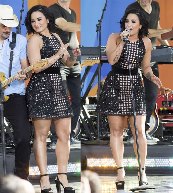 Demi Lovato dazzles on stage in a polka-dot fit-and-flare dress paired with bold black platform heels during her Good Morning America performance