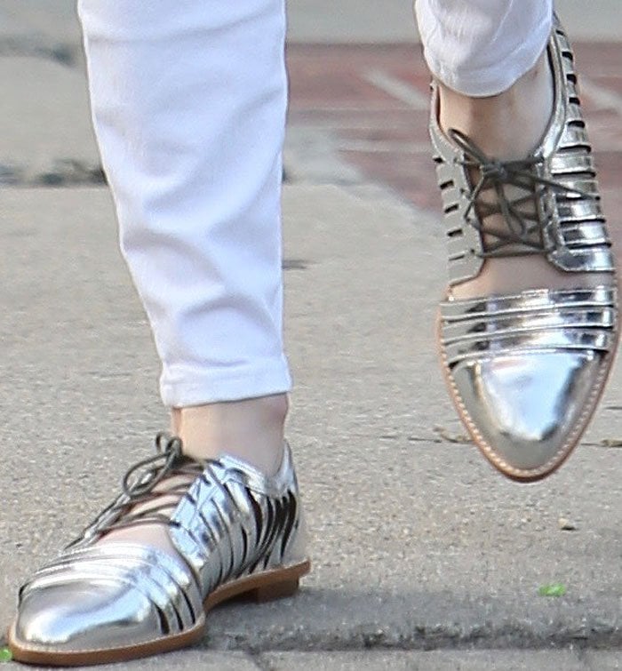 Emma Roberts dresses up a seemingly plain outfit with Loeffler Randall Fay oxfords in silver