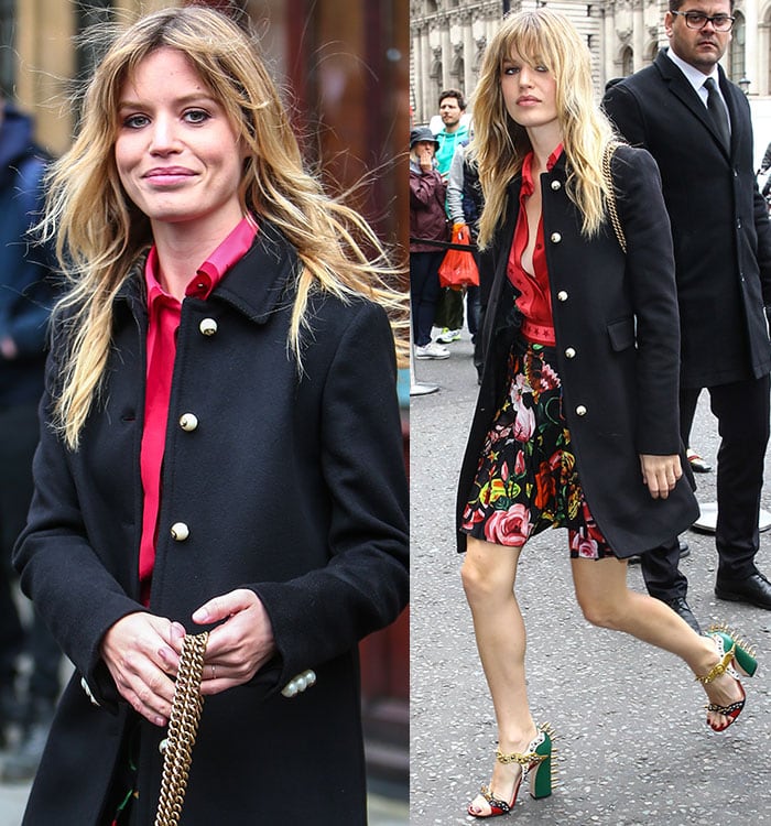 Georgia May Jagger layers a black trench coat over a red blouse and a floral-printed skirt