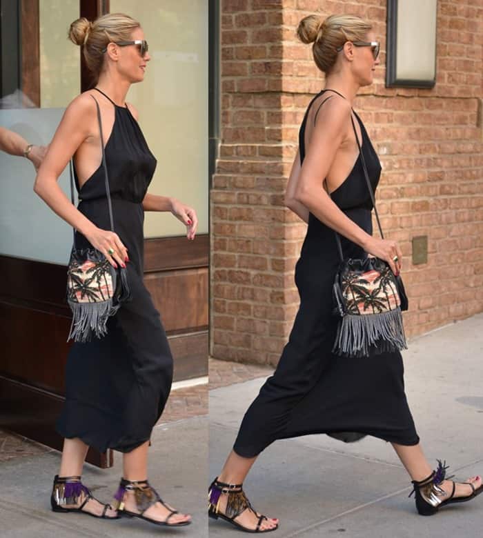 Saint Laurent completed her look with Nu Pieds multi-fringe sandals