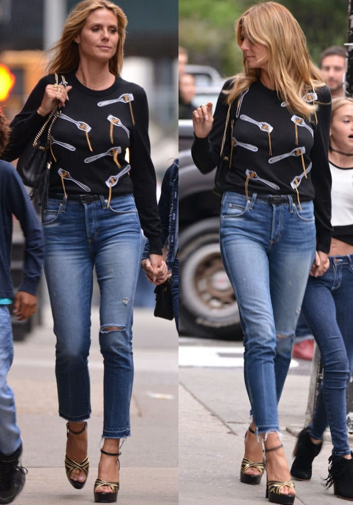 Heidi Klum wears a quirky spaghetti-print sweater from Libertine while out in Tribeca