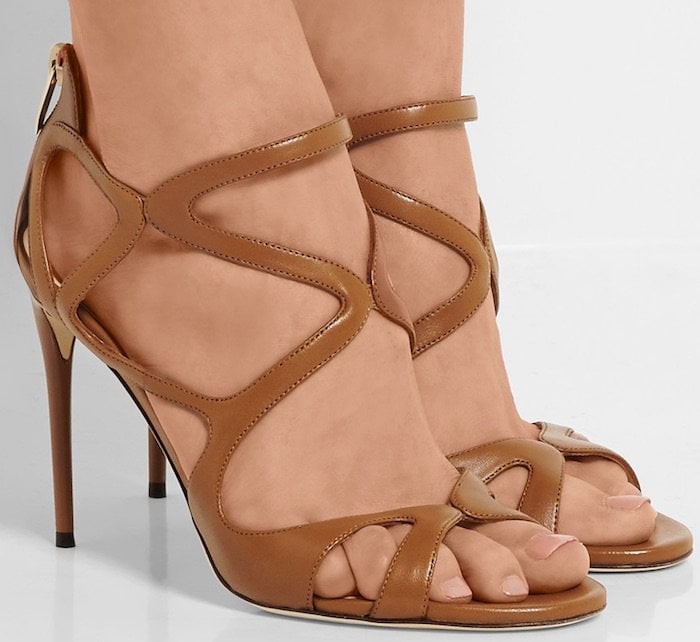 Jimmy Choo’s signature ‘Leslie’ sandals have caged straps to flatter and frame your foot