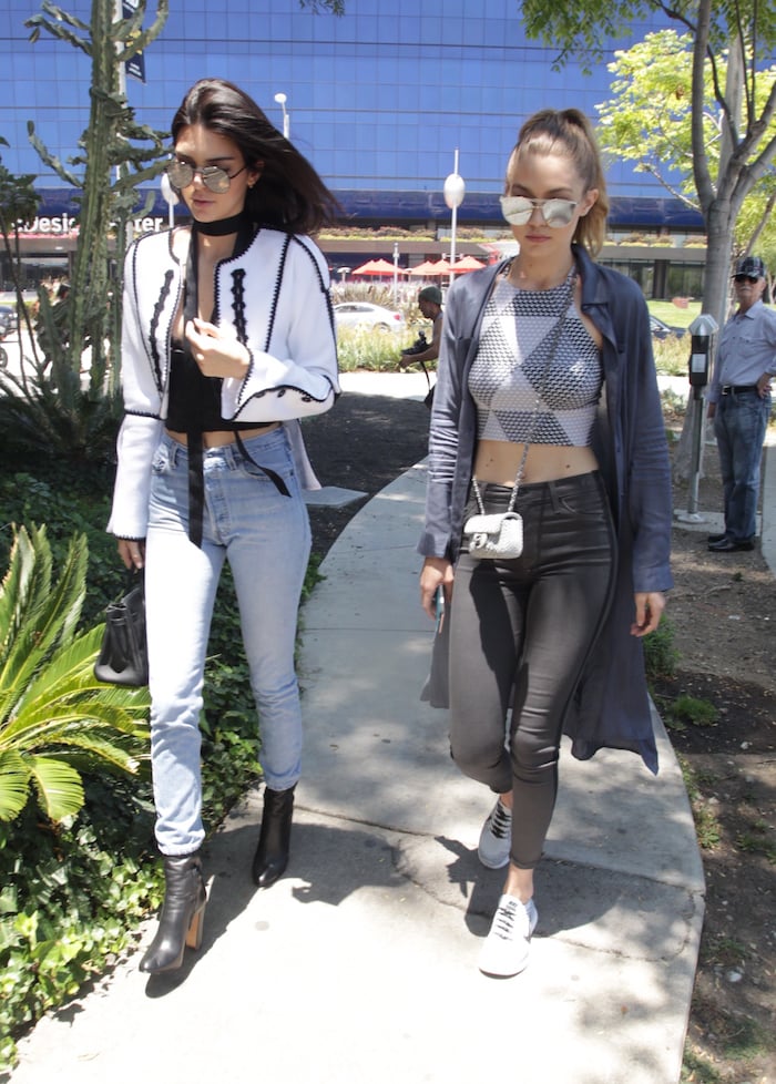 Kendall Jenner and Gigi Hadid wear monochrome ensembles while lunching together following Gigi's breakup with Zayn Malik