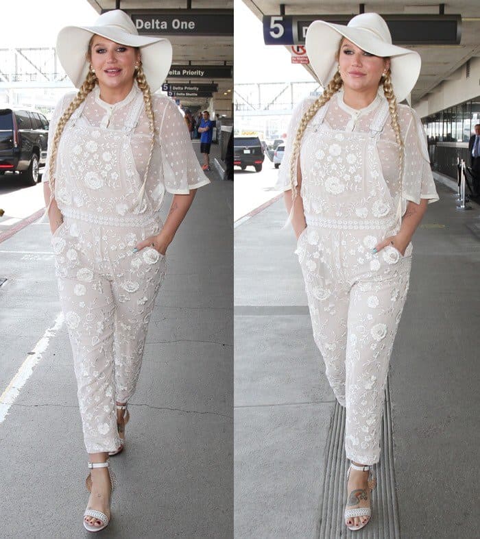 Kesha wears an all-white outfit at Los Angeles International Airport