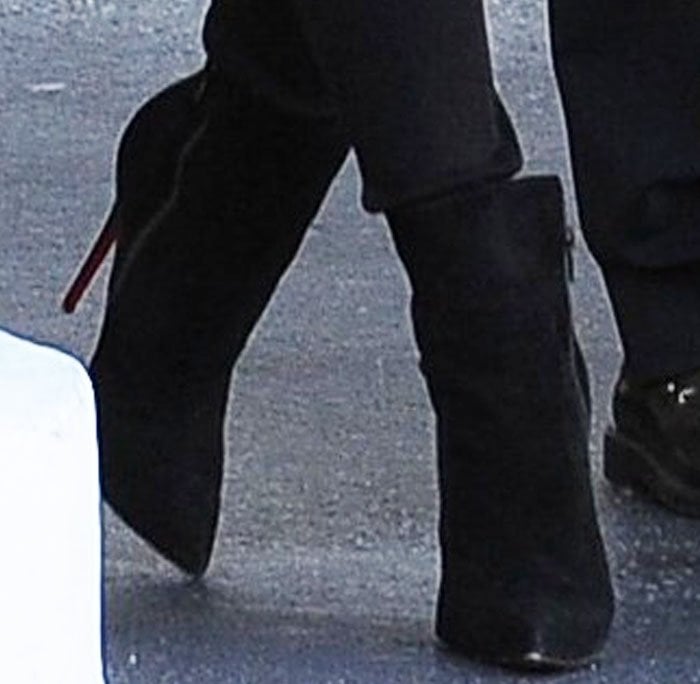 Khloé Kardashian shops at Saks in the Christian Louboutin "So Kate" ankle boot counterpart