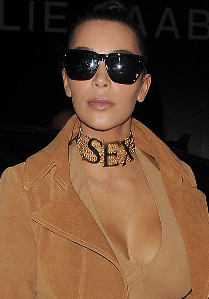 Kim Kardashian's gold Vivienne Westwood choker necklace emblazoned with the word SEX