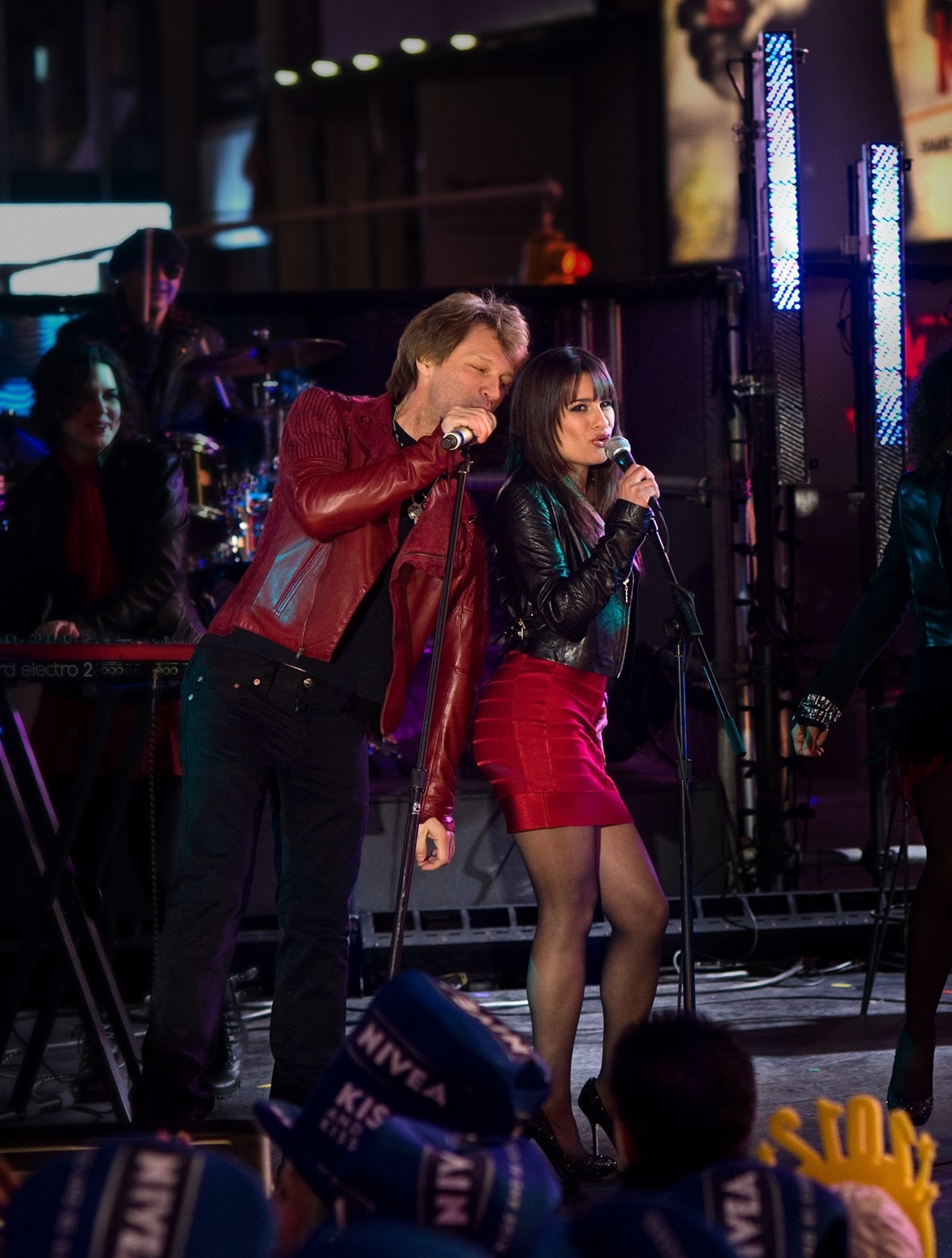Lea Michele as Elise and Jon Bon Jovi as Daniel Jensen sing together in the 2011 American romantic comedy-drama film New Year's Eve