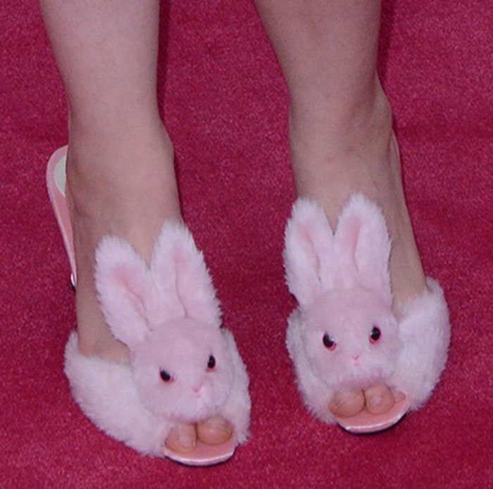 Lena Dunham's feet in pink Streetzie bunny slippers