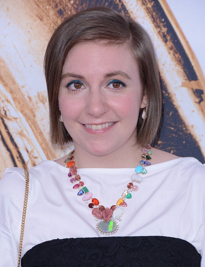 Lena Dunham side parts her hair for the 2016 CFDA Fashion Awards