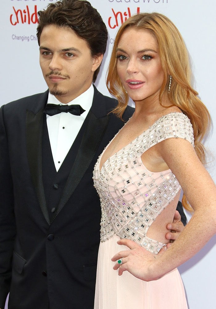 Lindsay Lohan and rumored fiancé Egor Tarabasov make their red carpet debut at the Caudwell Children Butterfly Ball, sparking engagement speculation