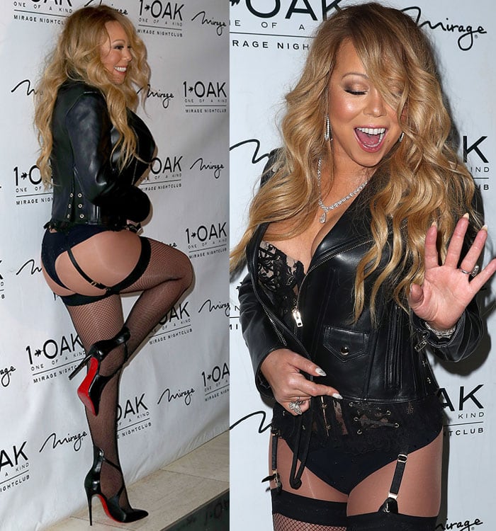 Mariah Carey wore a black sheer lace corset, which she paired with thigh-high fishnet suspenders