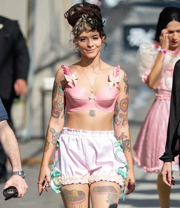 Showing off her numerous tattoos, Melanie Martinez appeared on Jimmy Kimmel Live! in September 2019 to promote her new album K-12