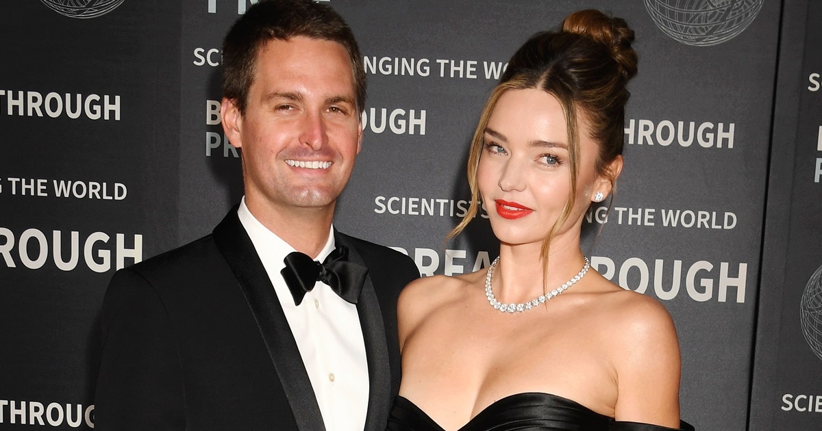 Miranda Kerr stuns in a seriously plunging LBD at the Louis