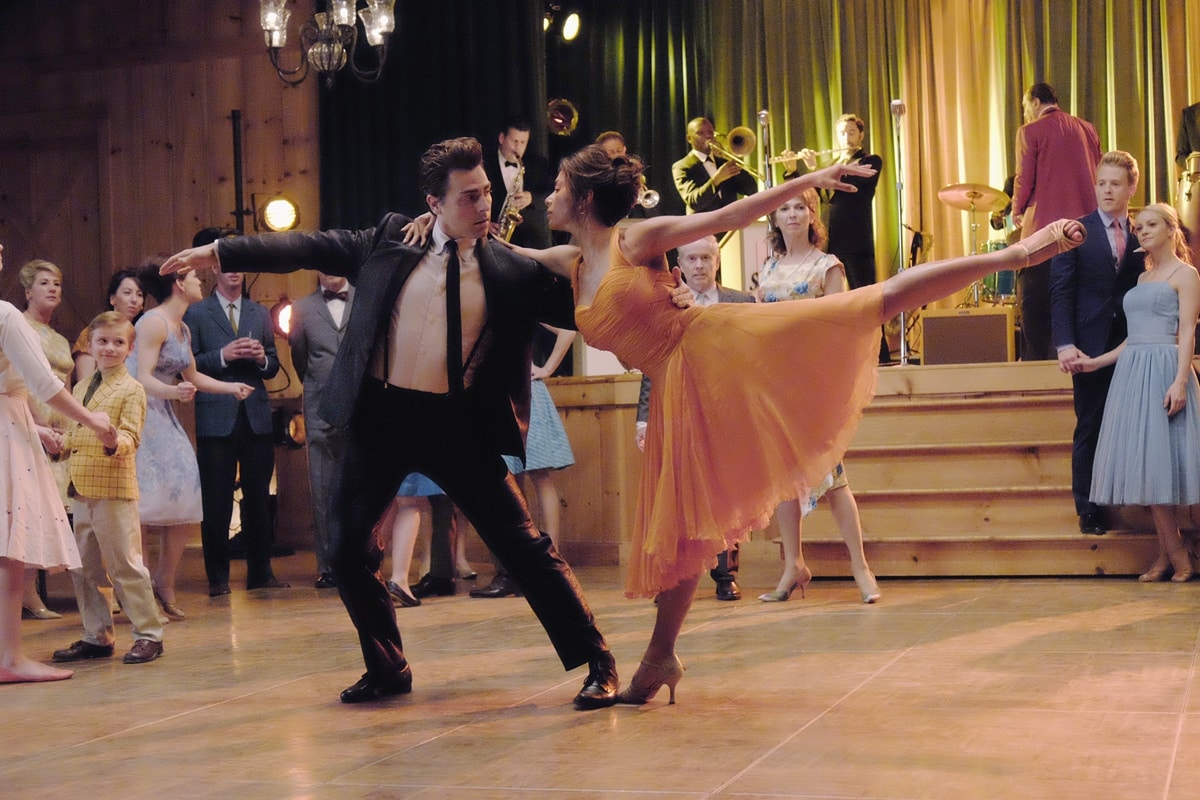 Nicole Scherzinger as Penny and Colt Prattes as Johnny Castle in the 2017 American television film Dirty Dancing