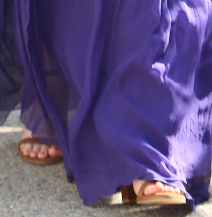 Olivia Munn's feet in Stuart Weitzman sandals