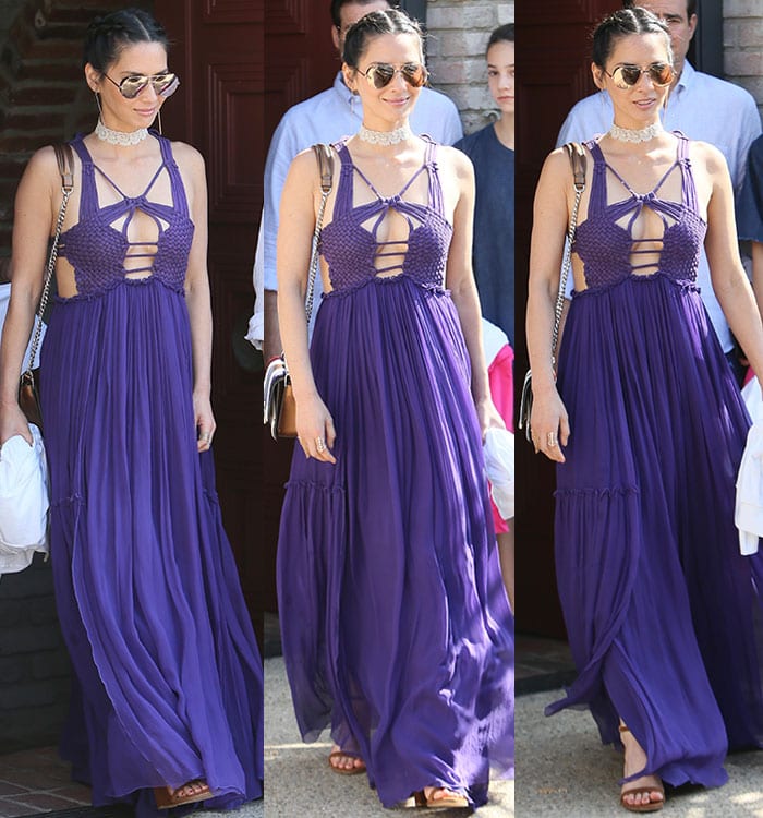 Olivia Munn flaunts her boobs while exiting a Joel Silver party in a flowing purple maxi dress that shows plenty of skin