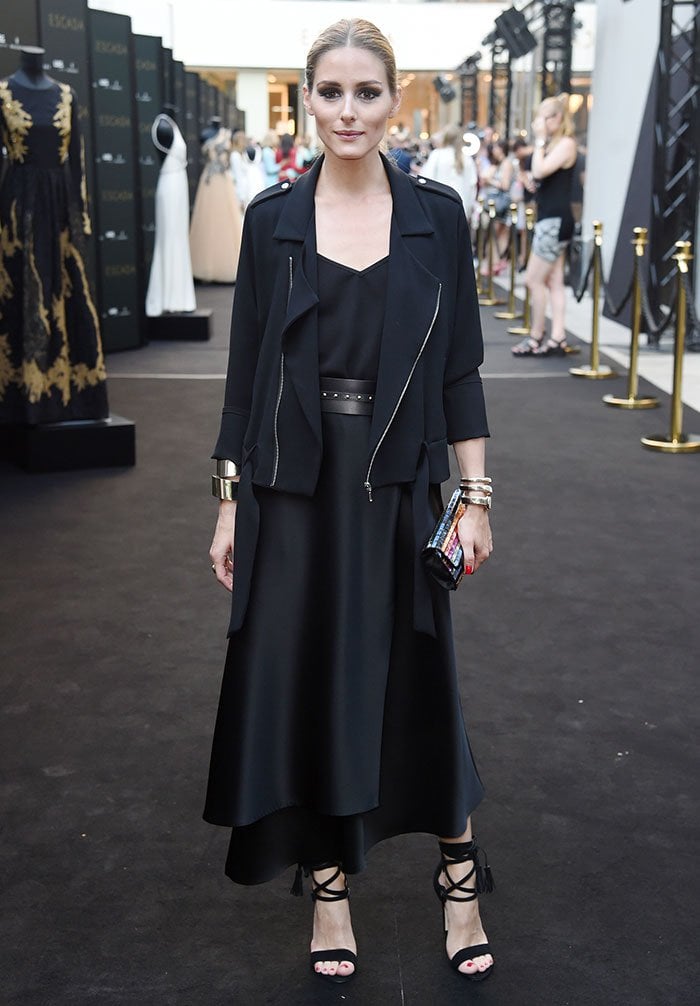 Olivia Palermo wears an all-black Escada outfit to a German store opening