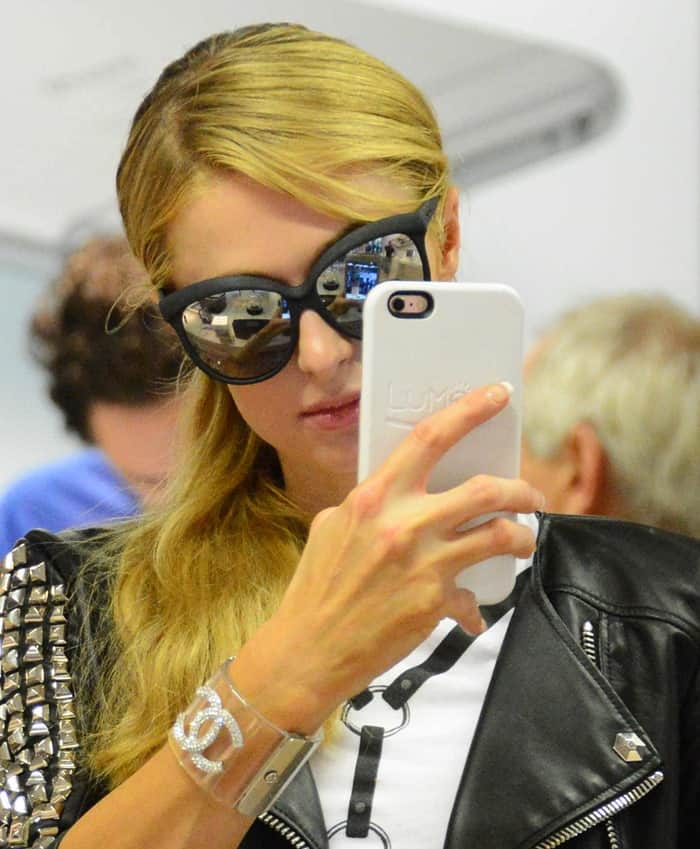 Paris Hilton wears sunglasses from Italia Independent