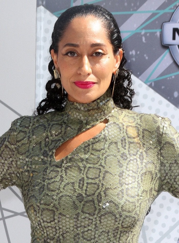 Tracee Ellis Ross styled her hair in sleek, defined curls pulled back tightly