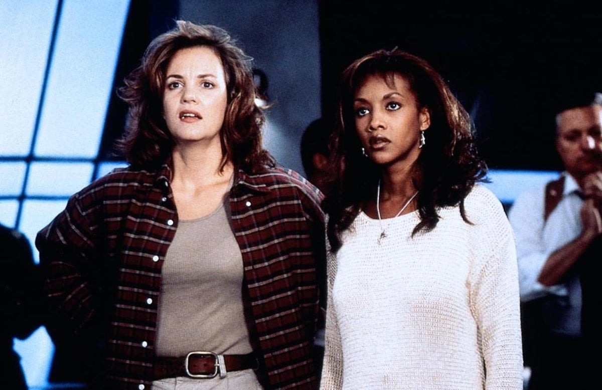 Vivica A. Fox as Will Smith's character's girlfriend, Jasmine Dubrow, and Margaret Colin as Constance Spano in the 1996 epic science fiction disaster blockbuster Independence Day