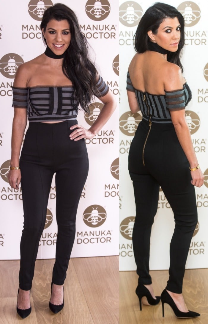 Kourtney Kardashian flaunts her curves with an off-the-shoulder Erdem top and high-waisted black skinny pants