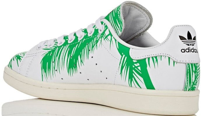 The iconic Stan Smith from the adidas Tennis archive carries the inspiration of Pharrell and his Billionaire Boys Club label for a unique spin on the timeless white and green tones