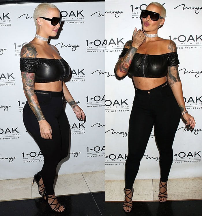 Amber Rose shows off her cleavage and midriff in Alexander Wang and Givenchy