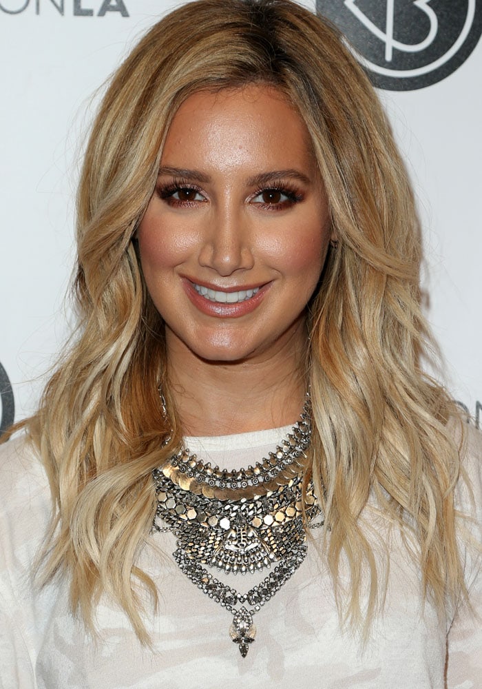 Ashley Tisdale wears her blonde hair in waves at the 4th annual BeautyCon Festival