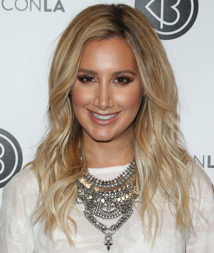 Ashley Tisdale styled her necklace with a Free People We the Free Army tee