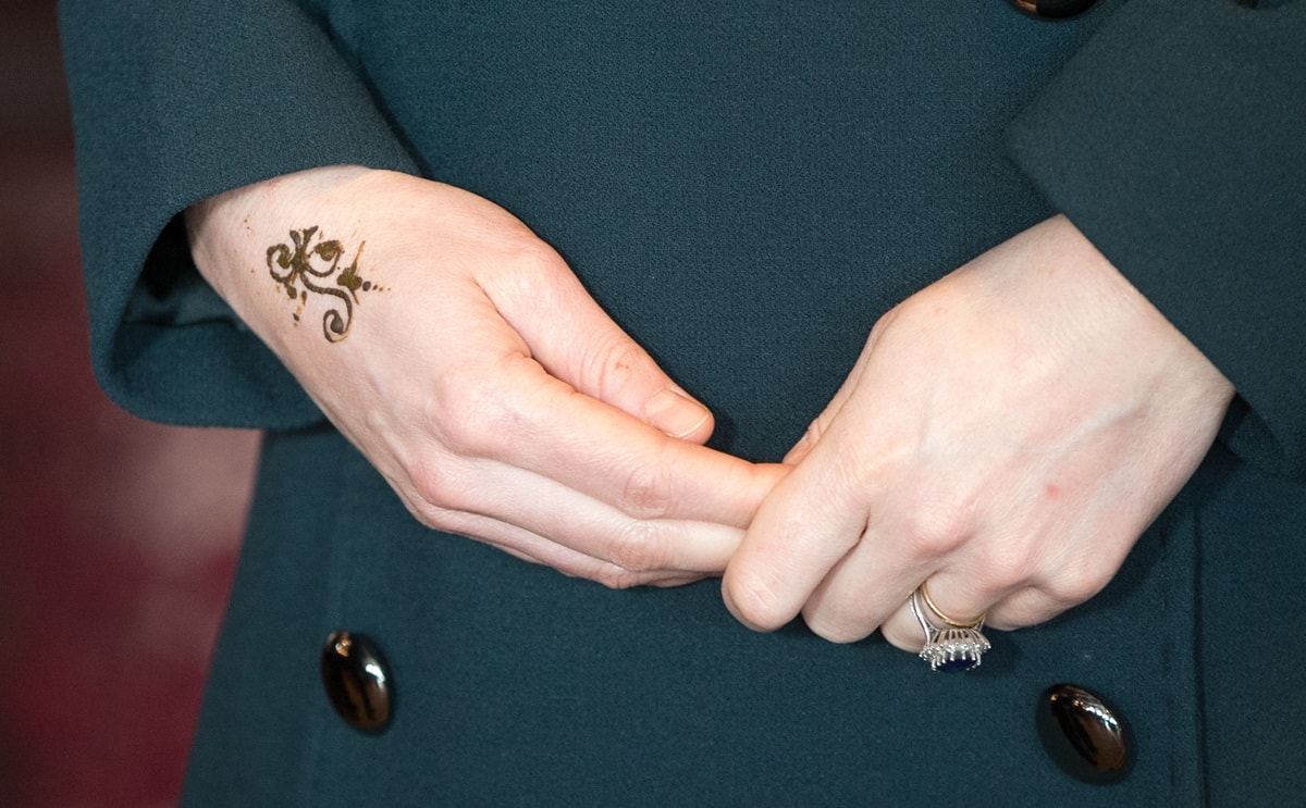 Shajida Begum decorated the Duchess of Cambridge's right hand with natural brown henna to create a small flower design