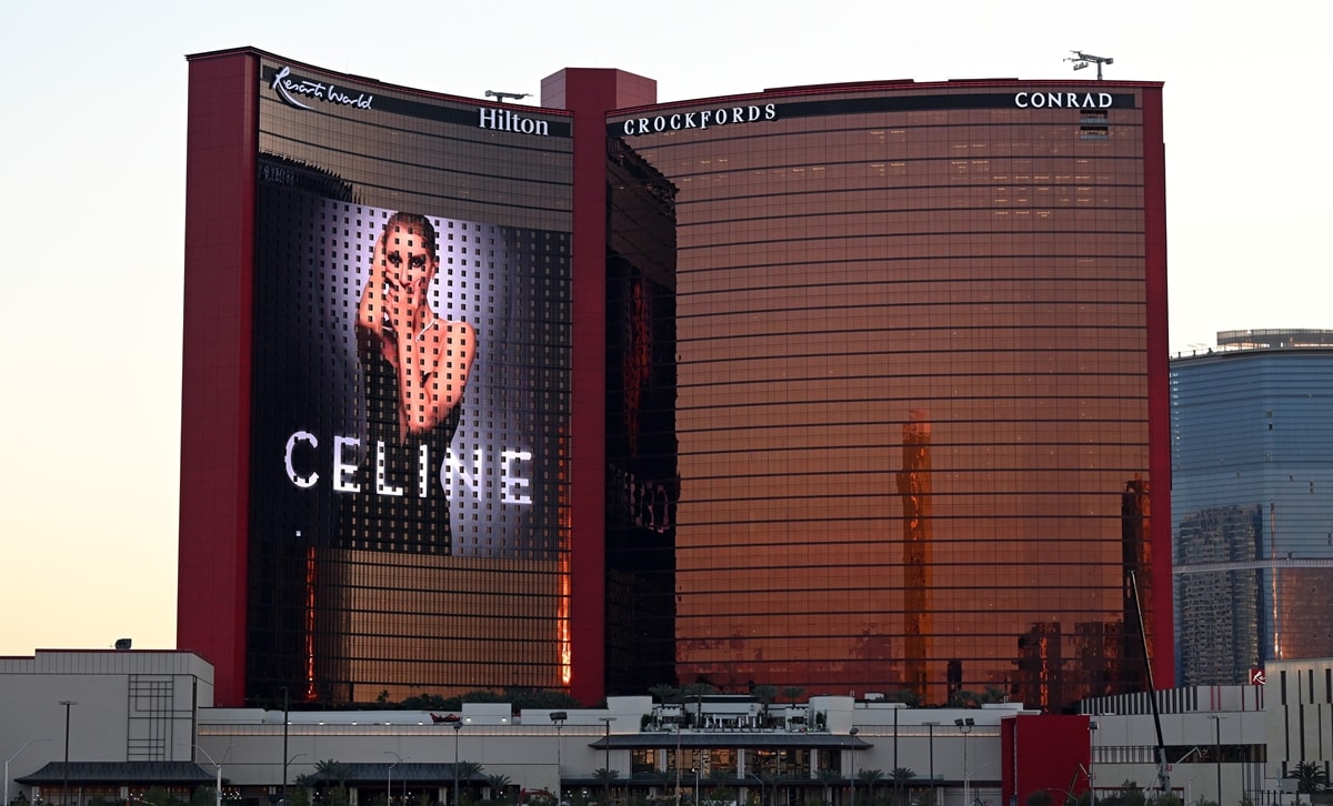 An LED screen displays an advertisement for Celine Dion's limited-run installment of ten dates in collaboration with Resorts World Las Vegas
