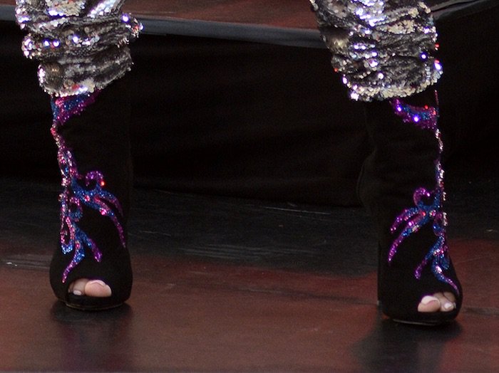 Celine Dion's feet in sequined Giuseppe Zanotti booties
